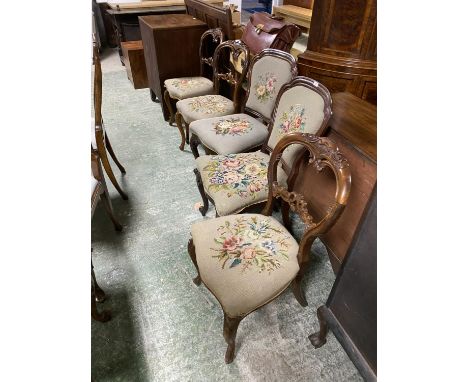 5 Victorian walnut chairs with tapestry seats (2 with tapestry backs) and an American style  rocking chair 