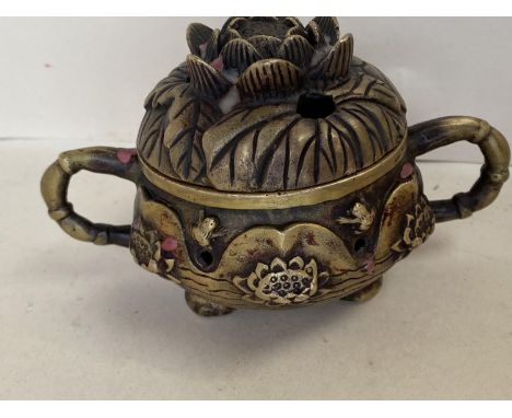 Chinese small embossed bronze 2 handled pot and cover, marks to base, 8cmH 