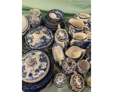 Quantity of blue and white china including Royal Worcester Avon scenes, Burleigh ware Willow, Ye old Chinese Willow; and a qu