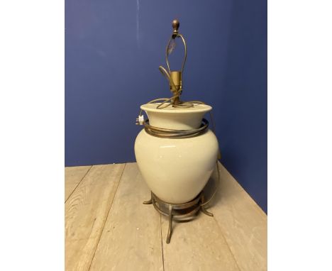 Large cream bulbous lamp on brass raised stand 