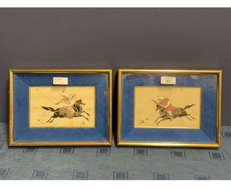 Pair of Iranian figures on horses in decorative clothing, playing a form of polo, in deep fabric gilt frames. And another ove