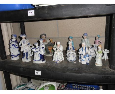 A shelf of figures & figurines