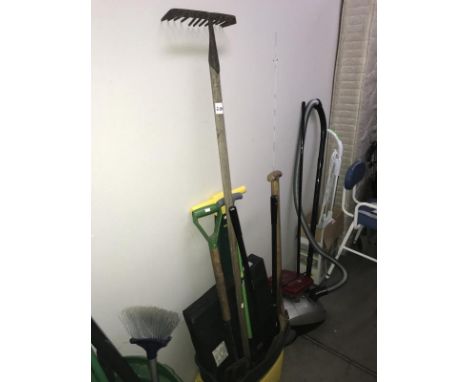 A quantity of garden tools including rake &amp; spade etc.