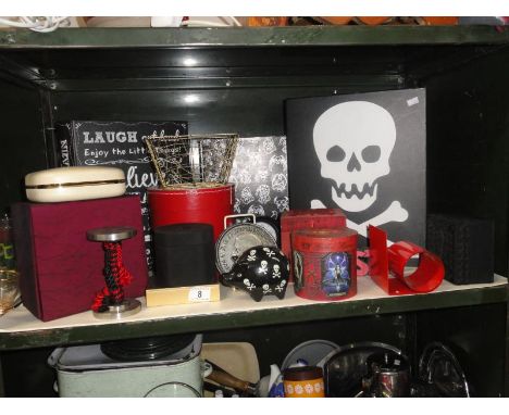 A shelf of miscellaneous boxes etc.
