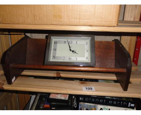 A bookshelf & a clock