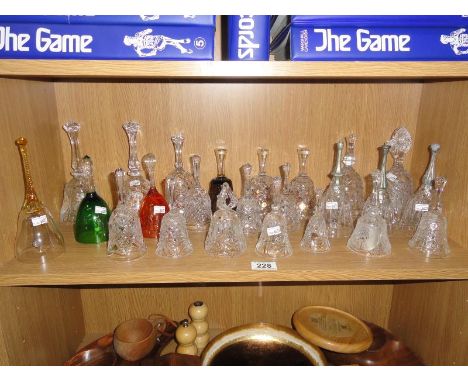 A shelf of glass bells