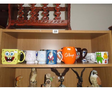 A shelf of assorted mugs