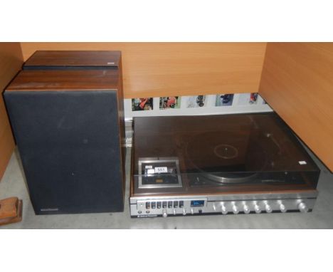 A Panasonic record player with 2 speakers