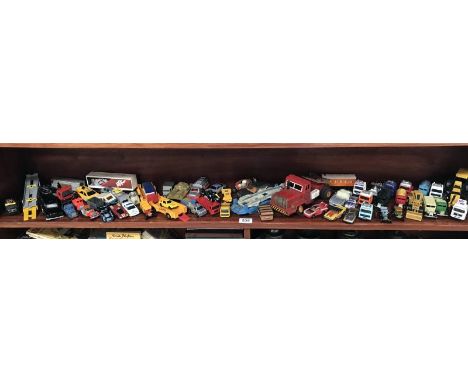 A shelf of assorted die-cast toys