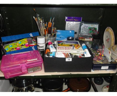 A shelf of art & craft materials