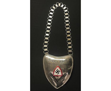 Reproduction RAD Gorget complete with chain. One tab marked "DRGM". Black felt backing cloth. 