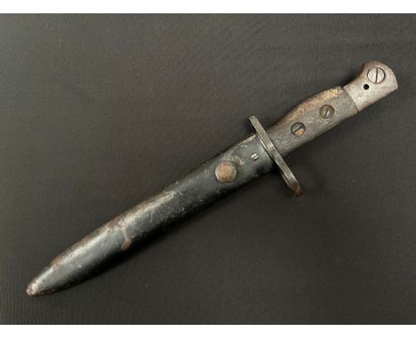 WW2 British No.5 Jungle Carbine Bayonet with fullered Bowie style blade 203mm in length. Maker marked "WSC" along with inspec