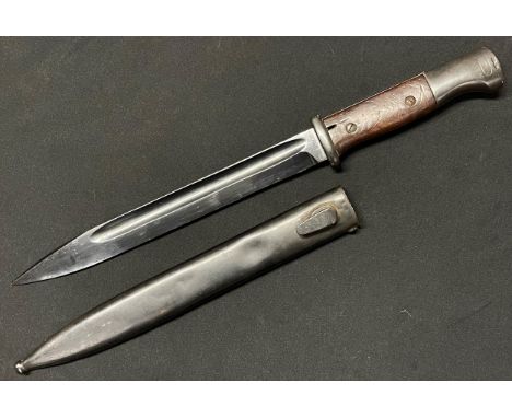 WW2 Third Reich K98 Bayonet with single edged fullered blade 250mm in length. Maker marked "Berg &amp; Co"  and dated "38" to