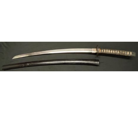 Japanese Katana Sword with single edged blade 630mm in length. Hamon line is visable. Tang is signed. Circular Tsuba. Overall