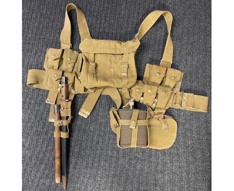 Set of reproduction WW1 British 1908 pattern webbing, complete with intert FFE .303 ammo in clips, water bottle, helve and an