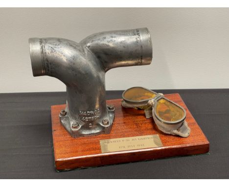 WW2 USAAF Lockheed P38 Lighting Fighter Engine manifold mounted on a wooden plinth with goggles and brass plaque "Lockheed P3