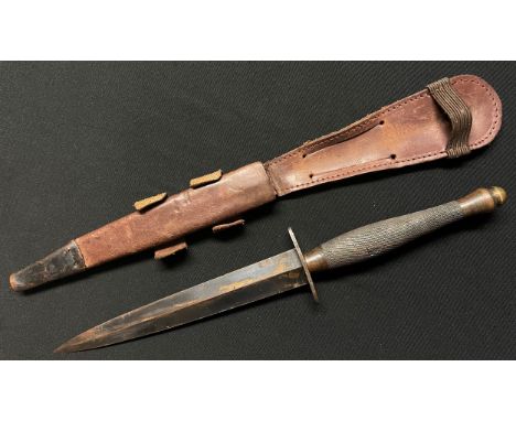 Reproduction Fairbairn Sykes 2nd Pattern Fighting Knife with double edged blade 176mm in length. Blade retains some blued fin