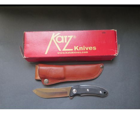 A Katz Knives Pro/45 Hunting Knife in leather sheath 