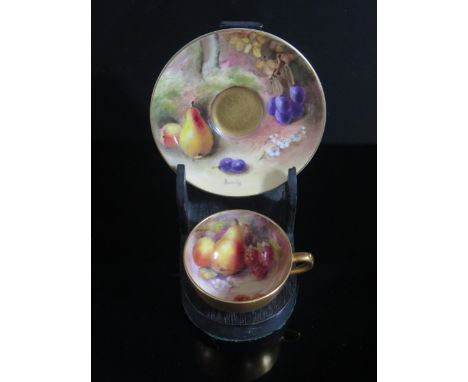 A Royal Worcester Fruit Decorated Cup and Saucer, cup signed Martin and saucer Ricketts, 1912 