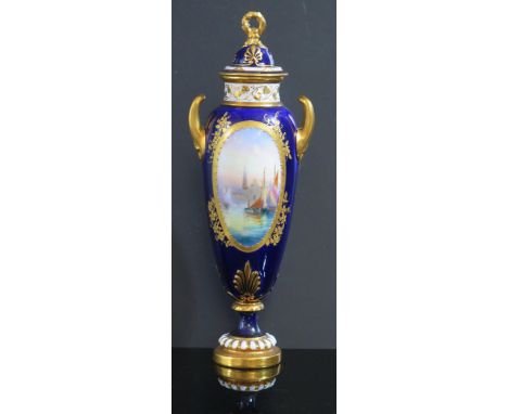 A Royal Worcester Harry Davis Two Handled Vase with Cover decorated with a Venetian scene on a royal blue ground with gilt hi