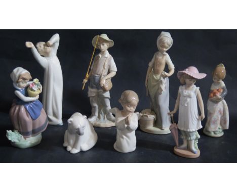 A Collection of Six Lladro and Two Nao Ornaments 