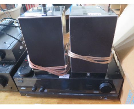 An Eltax Acura Amp-70 Integrated Amplifier and pair of Yamaha NX-TS20 speakers 