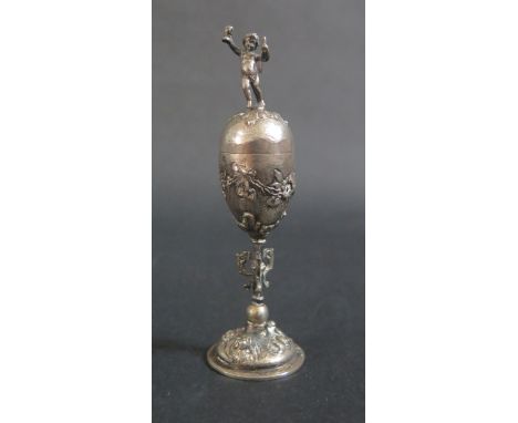 A Small Continental Silver Cup with Cover decorated with a putto finial, 11.5cm, 43g 