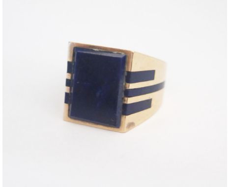 An Unmarked Yellow Gold, Lapis Lazuli and Blue Enamel Ring, size R.5, 10.8g 