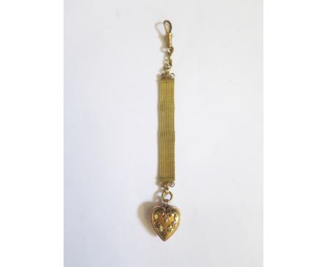A High Carat Gold Heart Shaped Pendant Fob on gold mesh sash with clip, unmarked, 119mm, 10.7g