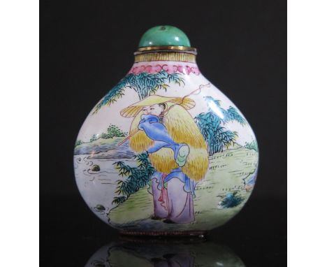 A Chinese Enamel Snuff Bottle decorated with figures in a landscape with a torquoise stopper and bone dipper