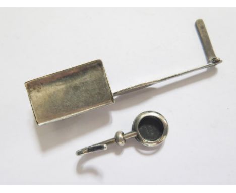 A Sterling Silver Clip (3.2g) and patented white metal clip 