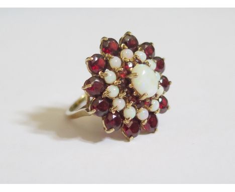 A Large 9ct Gold, Opal and Garnet Cluster Ring, head 25mm, size O, 7.1g 