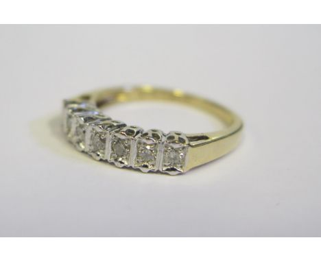 A 9ct Gold and Diamond Seven Stone Ring, size k.5, 2.5g 