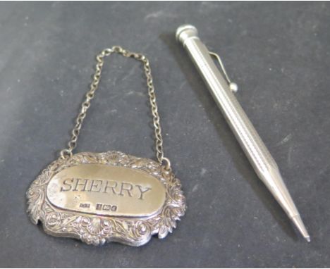 A Sterling Silver Propelling Pencil and Birmingham silver SHERRY label 
