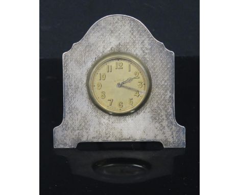 A George V Silver Easel Back Clock with engine turned decoration, 9.5cm high, Birmingham 1926, Spurrier &amp; Co., movement n