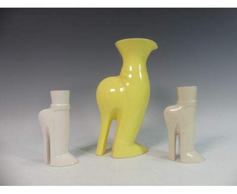 Lawson E. Rudge (b. 1936), a yellow glazed studio pottery Stiletto Vase, H 29cm, together with a pair of Salts in similar sty