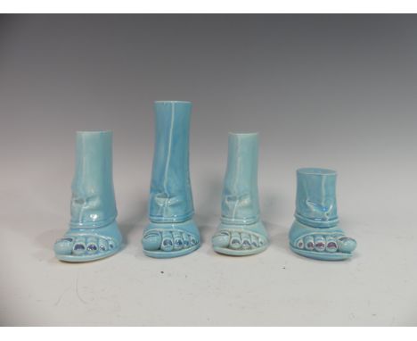 Lawson E. Rudge (b. 1936), a pair of blue glazed studio pottery Salt and Pepper Pots, modelled as feet with painted toenails,