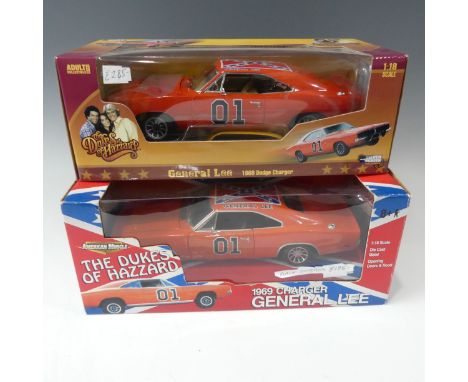 A boxed Dukes of Hazard General Lee 1969 charger, American Muscle, 1:18 scale diecast model with black interior together with