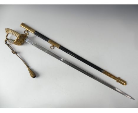 A 20thC Elizabeth II Naval ceremonial sword, gilt brass hilt with lions head, Naval crest and ornate bullion knot, steel blad