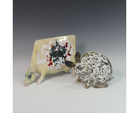 Lawson E. Rudge (b. 1936), a studio pottery sculpture of a Grazing Cow, H 26cm, together with a round Hare (2) Provenance: fr