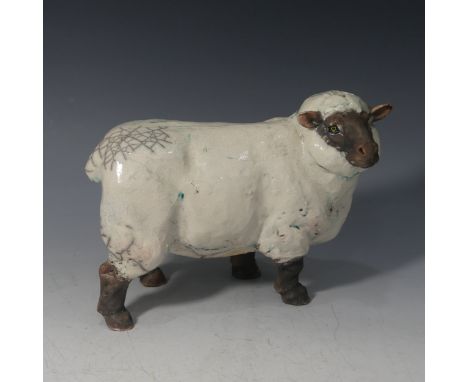 Keza Rudge (British 20th Century), a pottery model of a Sheep, signed K Rudge, L 28cm x H 22cm. 