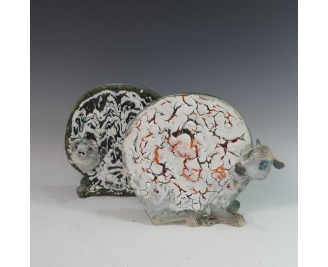 Lawson E. Rudge (b. 1936), a raku fired studio pottery sculpture of a round Cow, H 27cm, together with another sculpture of a