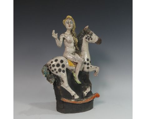 Lawson E. Rudge (b. 1936), a raku fired studio pottery sculpture of Lady Godiva, modelled on horseback, H 40cm. Provenance: f