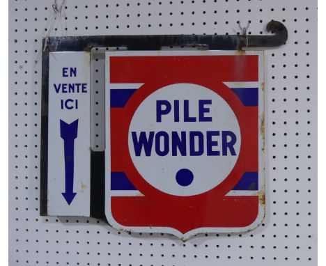 A vintage wall hanging French metal sign, advertising 'PILE WONDER', on sale here, double sided sign with blue lettering and 