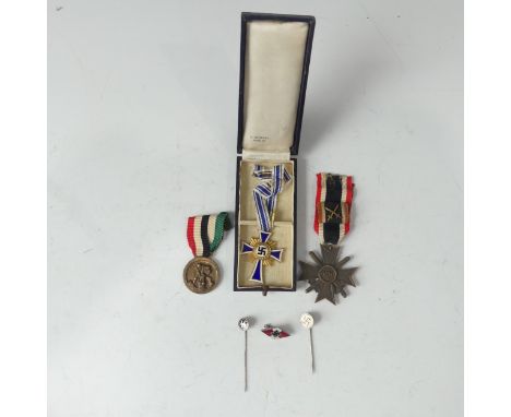 A German WW2 period Mother's Cross (Der Deutschen Mutter), gold award, in presentation case marked 'R.Souval Wien VII', toget