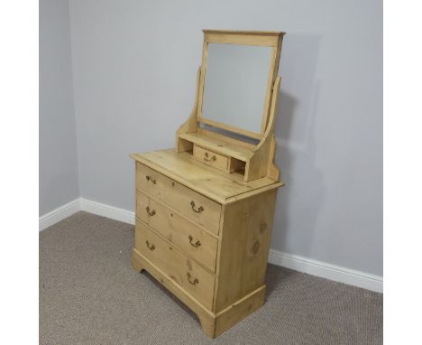 A vintage pine Dressing Table, with mirror above a central drawer, on a base with three further drawers, W 86cm x D 45cm x H 