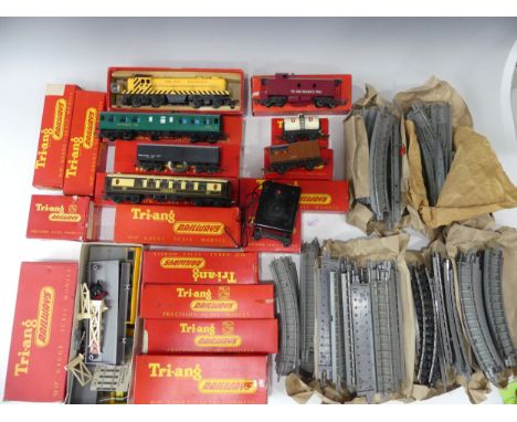 A quantity of Tri-ang '00' gauge model railway, many boxed pieces, including R155 Diesel Switcher locomotive, yellow, boxed, 