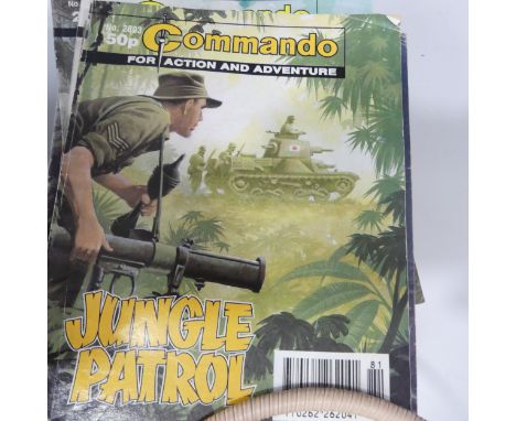 A collection of Collectors items, to include a bag of British Pennies, 43 editions of Commando Comics, a clockwork cat in bas