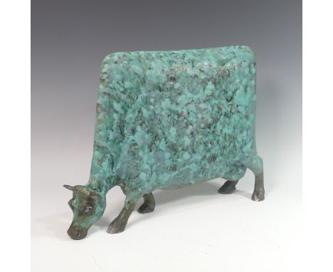 Lawson E. Rudge (b. 1936), a raku fired studio pottery sculpture of a Grazing Cow, with metallic finish, H 35cm. Provenance: 