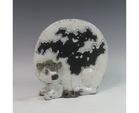 Lawson E. Rudge (b. 1936), a raku fired studio pottery sculpture of a round Cow, numbered 22, H 26cm. Provenance: from the st
